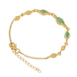 Emerald and White Topaz Gold Bracelet